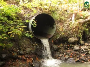 A culvert is a large pipe that expels excess water. This is one type of landscape drainage system. 