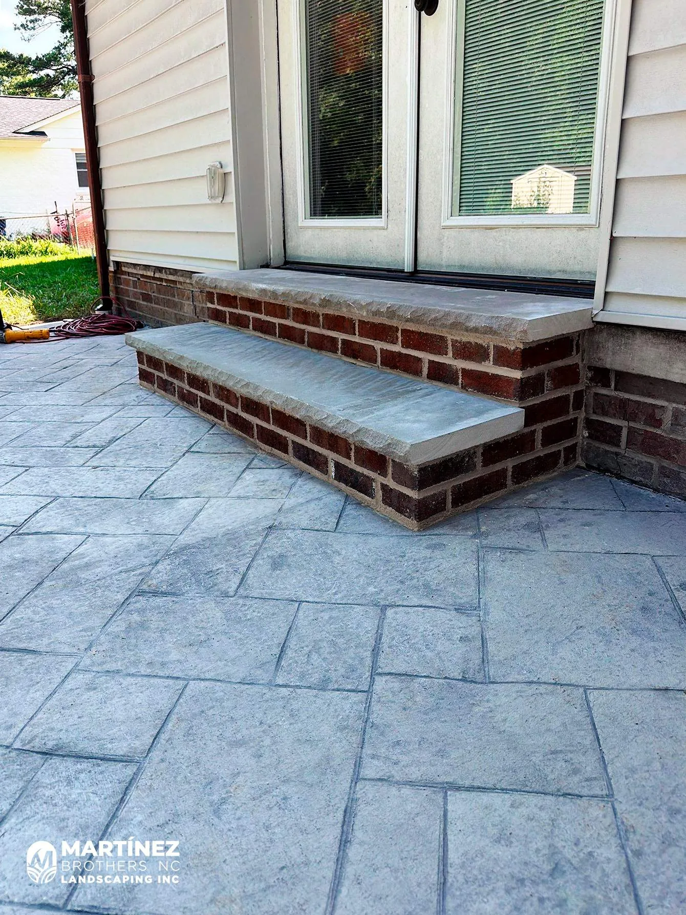 Outdoor brick steps and patio hardscaping in Durham NC